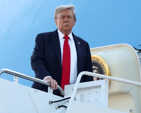 US president Donald Trump boards Air Force One as he departs for Alaska to meet with Russian President Vladimir Putin to negotiate for an end to the war in Ukraine, from Joint Base Andrews in Maryland.