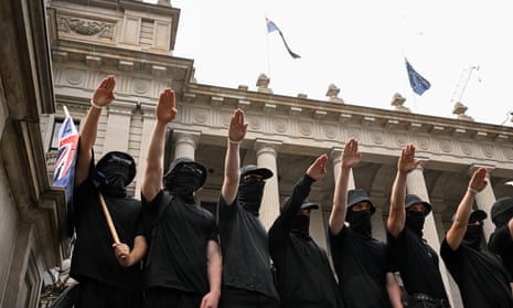 Neo-Nazi protesters outside Parliament House in Melbourne today.