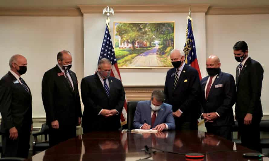 Governor Brian Kemp signs the much-criticized Election Integrity Act of 2021.