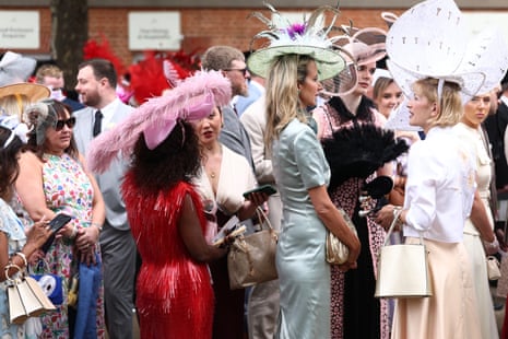 Racegoers queuing to get in at Royal Ascot.