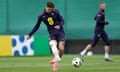 John Stones sports extensive strapping on his right knee during England training