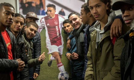A picture of Abdelhak Nouri hangs on the wall in his former school, the Calvijn College, in Amsterdam West.