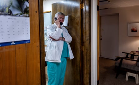 Dr Warren Hern on the phone in his clinic in Boulder, Colorado in 2022.