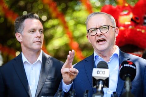 NSW Labor leader Chris Minns listens as prime minister Anthony Albanese speaks to the media in Sydney today