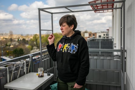 Oxana Lytvychenko, Ukrainian reproductive rights activist, looks out over a balcony