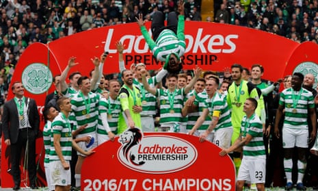 Celtic’s Efe Ambrose is head over heels as he celebrates with his team-mates after the champions finished the Scottish Premiership season unbeaten.
