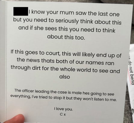 A photo of the inside of a card sent to the victim. In the message, Tritta tries to intimidate the victim into dropping the case