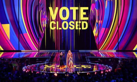 Hosts Julia Sanina and Hannah Waddingham announce voting has closed during the first semi-final