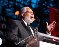 a man speaks into a microphone