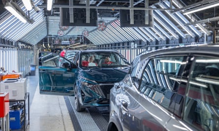 Cars on a factory assembly line
