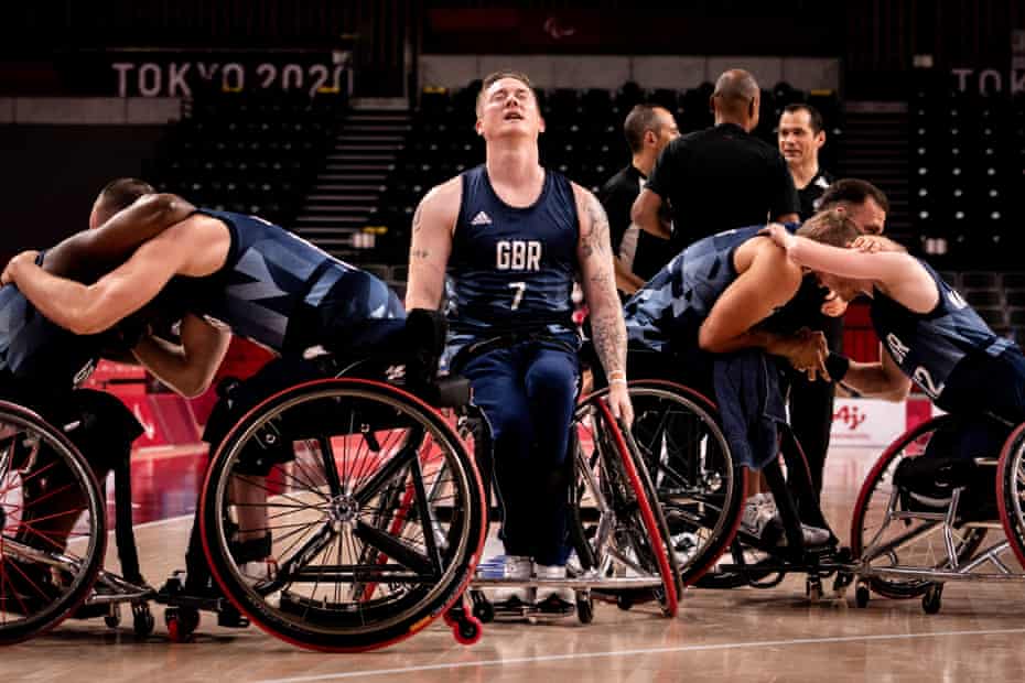 Britain’s Terry Bywater (C) closes his eyes after his team won the wheelchair basketball men’s bronze medal match against Spain during the Tokyo 2020 Paralympic Games at the Ariake Arena in Tokyo on September 5, 2021