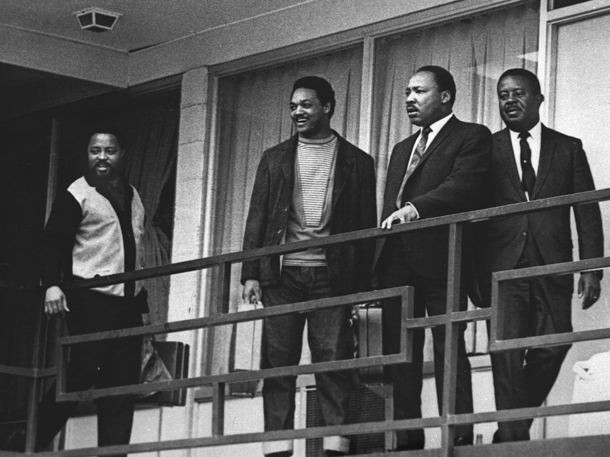 The Rev Martin Luther King stands with Jesse Jackson and other civil rights leaders on the balcony of the Lorraine motel in Memphis on 3rd of April 1968. The image shows Jesse Jackson and Martin Luther King at centre.