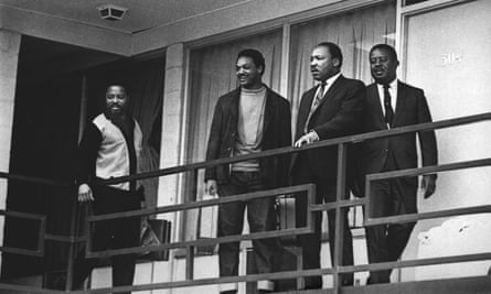 Martin Luther King Jr. stands with other civil rights leaders on the balcony of the Lorraine Motel in Memphis on April 3, 1968, a day before he was assassinated on the same balcony.