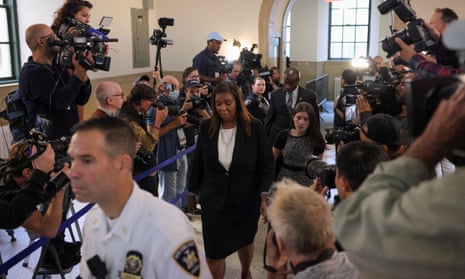 New York attorney general Letitia James wades through the press.