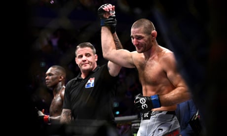 Sean Strickland stuns Israel Adesanya for UFC middleweight title in Sydney