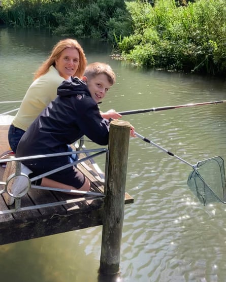 Roome fishing with her son, Jools.