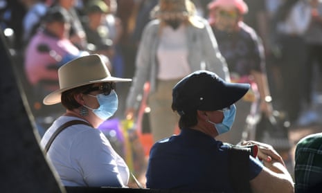 People are seen wearing masks on Peoples Day during the Royal Queensland Show at Brisbane Showgrounds