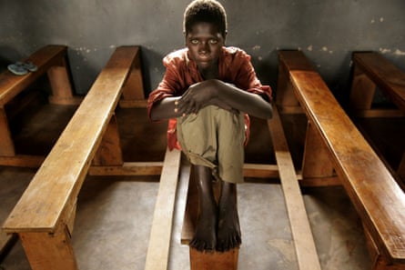 Evelyn Apio, then 13, at a camp for displaced people in Lira, northern Uganda, in 2005. She was abducted and taken to the bush for six months by the Lord’s Resistance Army.