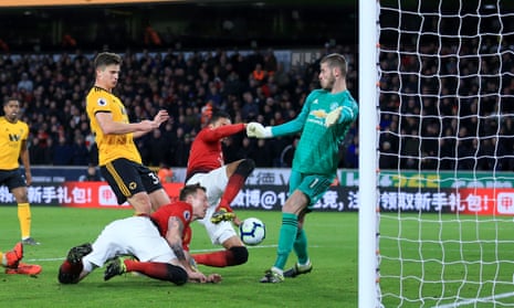 Wolves get the ball over the line for their second of the night through a combination of Leander Dendoncker and Chris Smalling to take the lead at Molineux.
