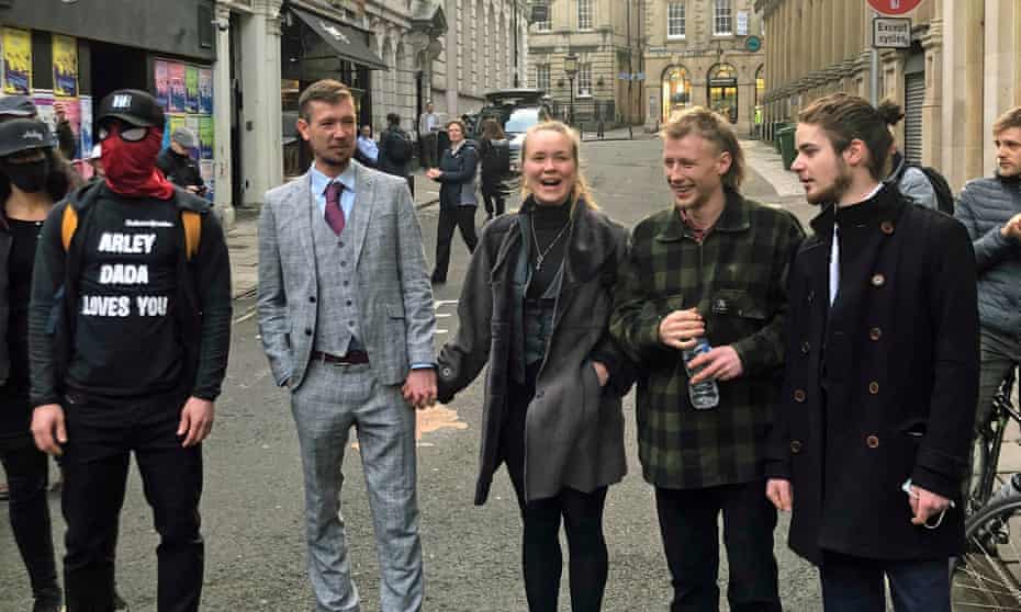 Jake Skuse (left), Rhian Graham (centre), Milo Ponsford (second right) and Sage Willoughby (right) arrive at Bristol Crown Court ahead of their trial.