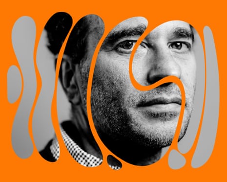 A black and white image of Rafael Behr framed by an orange border