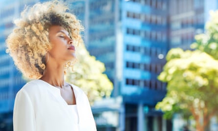 Women taking a deep breath