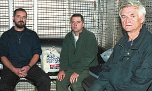 Niall Connolly (left), Martin McCauley (centre) and James Monaghan in Bogota, Colombia, after their arrest in 2001