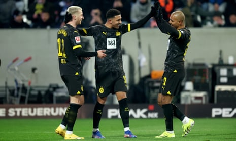 Jadon Sancho celebrates after setting up Marco Reus for Borussia Dortmund’s second goal in their 3-0 win over Darmstadt.