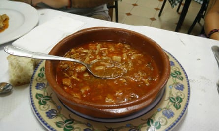 Bowl of stew on a table at restaurant Casa Juanín, Pendones, Asturias