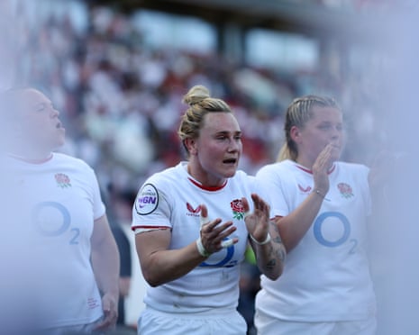 Meg Jones of England in a huddle in 2026