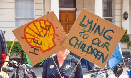 A demonstrator holds anti-Shell placards outside the Science Museum in London in July.