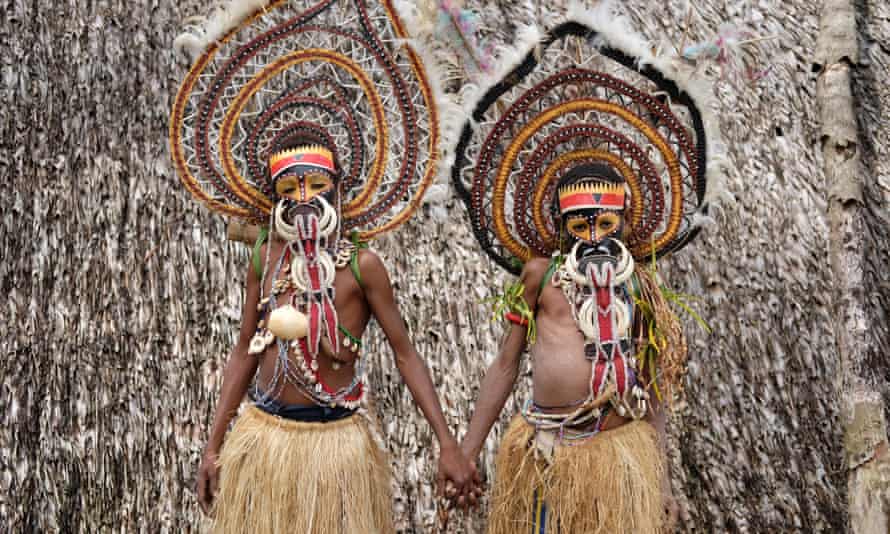 Two pre-adolescent boys who are dressed for yam spirit ritual from Abelam tribe in Papua New Guinea. Taken in Maprik District, East Sepik, Momase Region, Papua New Guinea.