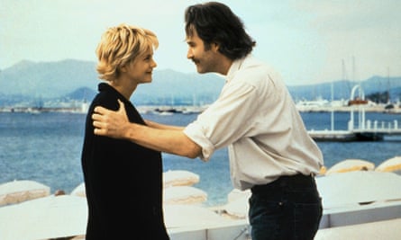 Two people on a beach strand
