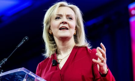 Liz Truss standing at a podium