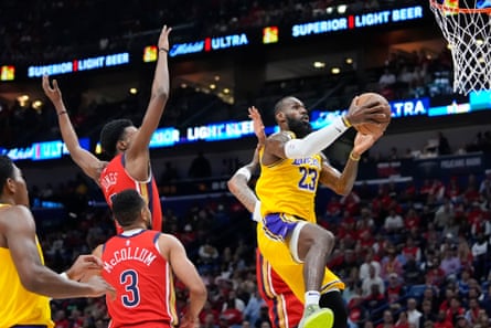 Lakers forward LeBron James drives to the basket during the first half of Tuesday’s game.