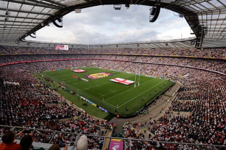 A packed stadium is seen as the players line up for the anthems.