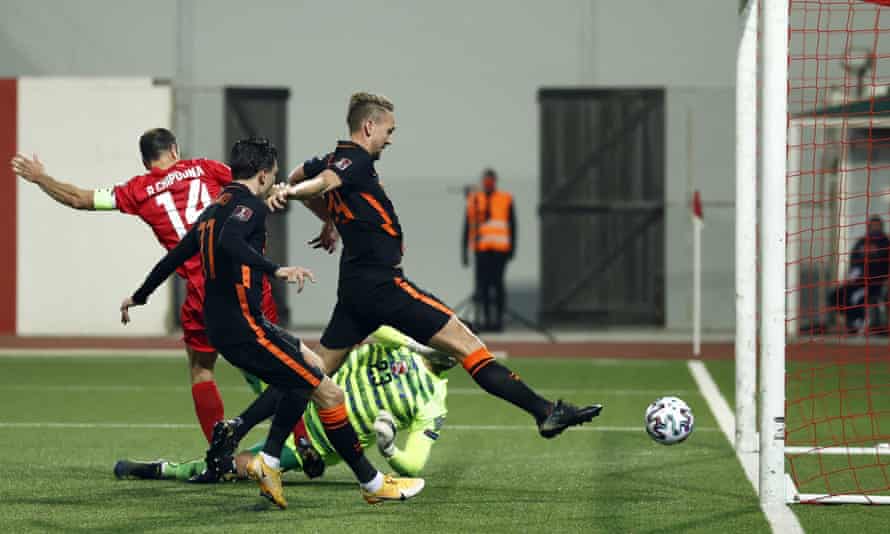 Luuk de Jong stretches to score the second goal for the Netherlands from close range in the 7-0 win over Gibraltar