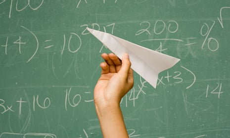 Student about to throw paper aeroplane