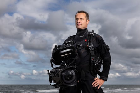 Peter van Rodijnen in diving gear stares into the distance