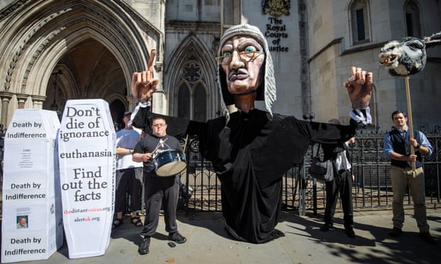 Anti-euthanasia campaigners outside the Royal Courts of Justice in London