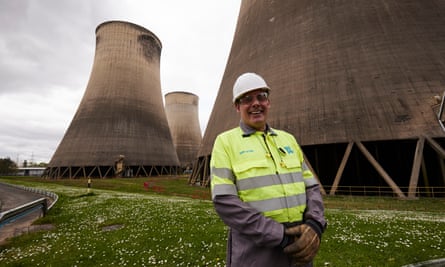 engineer in front of cooling towers