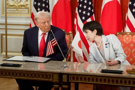 Donald Trump and Sanae Takaichi during a signing ceremony for a document on the implementation of the US-Japan trade deal in Tokyo, on 28 October 2025.