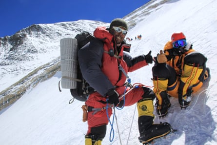 Mountaineers give the thumbs up on Mount Everest