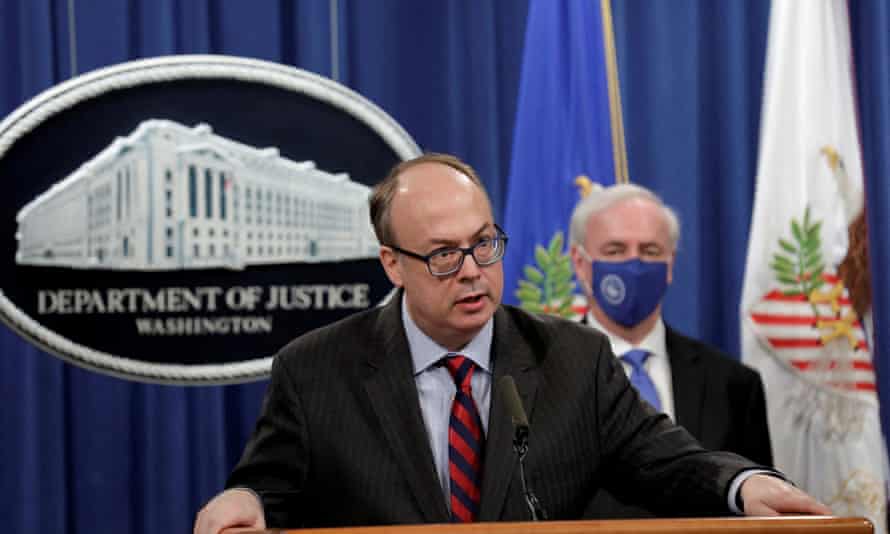 Then-acting assistant US attorney general Jeffrey Clark speaks next to then-deputy US attorney general Jeffrey Rosen at a news conference, at the Justice Department in Washington, DC, on October 21, 2020.