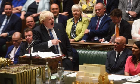 A handout photograph released by the UK Parliament shows Britain’s Prime Minister Boris Johnson speaking during his final Prime Minister’s Questions at the House of Commons.