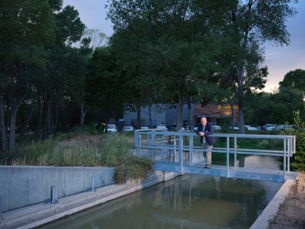 Man on bridge over canal