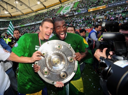 Edin Dzeko and Grafite with the Bundesliga trophy in 2009.