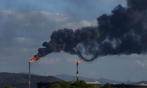 Gas is flared at the Jose Antonio Anzoategui oil complex in Barcelona