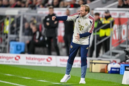 Bayern’s assistant coach Aaron Danks gestures during the Bundesliga match between Freiburg and Bayern Munich