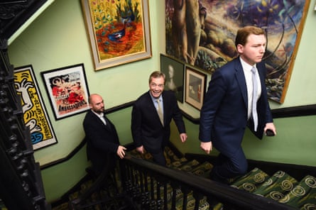Cottrell, Farage and another man walking up a staircase